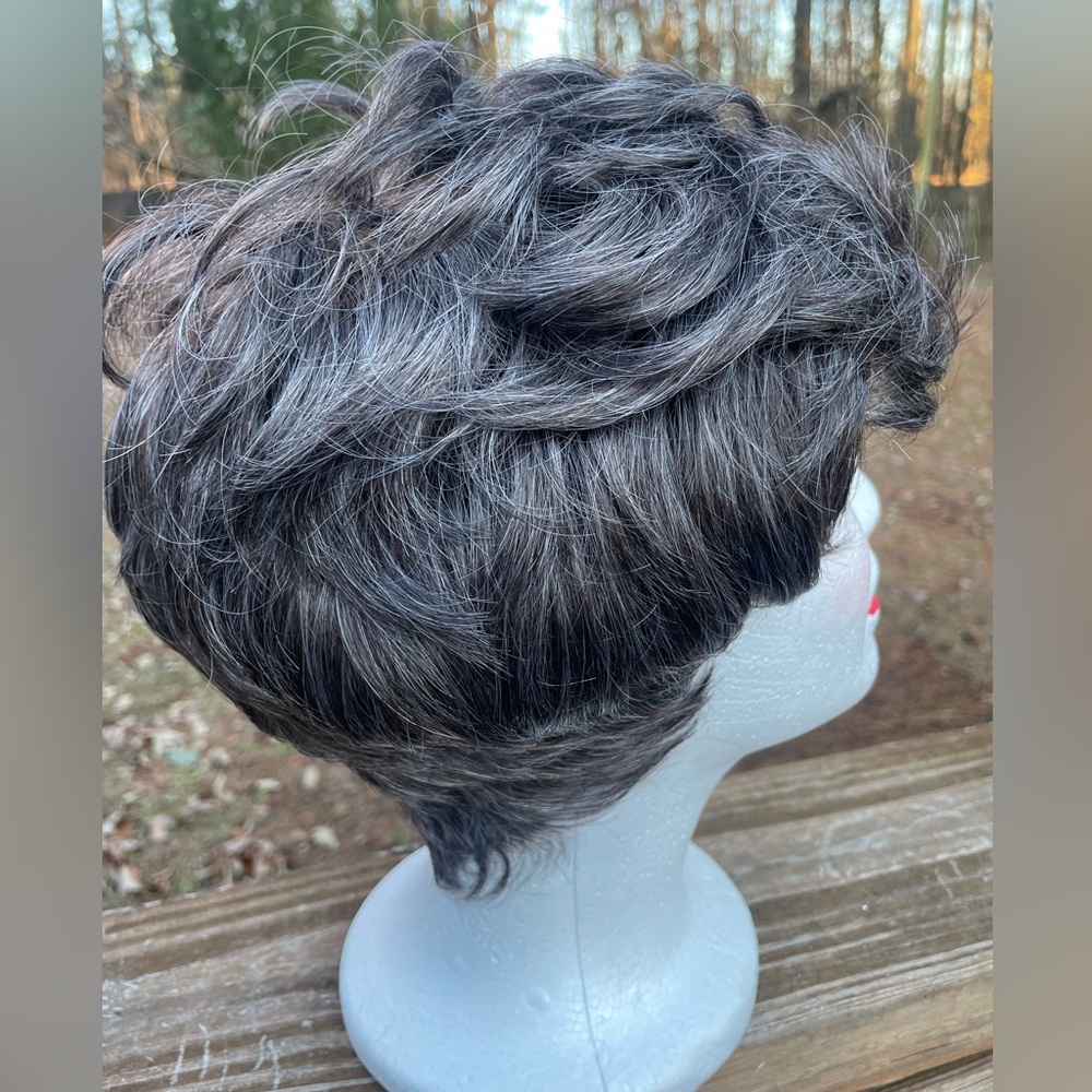 Dark Gray with Gray in it Short Wig for Women. It’s synthetic.